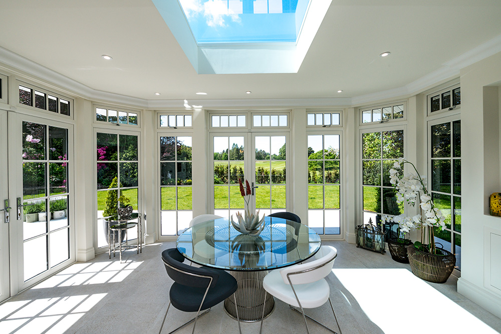 light open room with windows and patio doors