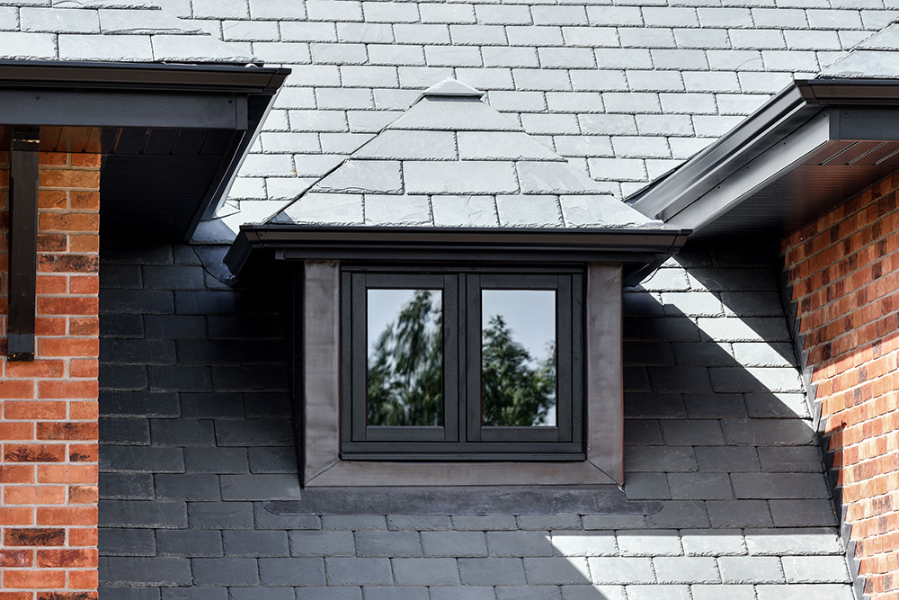 black slate tiled roof with window